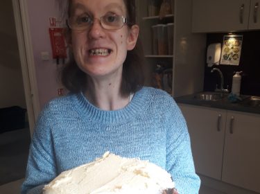 Louise proud of her cake